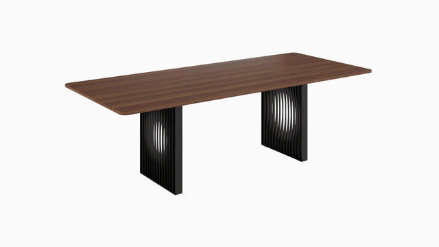 The Phantom table offers a sleek, visually-intriguing dining solution. Pictured here with a solid Walnut tabletop and black steel base.