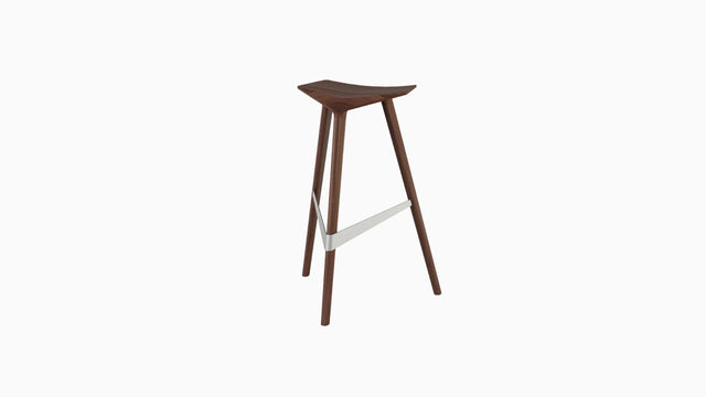 The Delta stool is designed to look aerodynamic and agile, much like the supersonic jets it is inspired by.