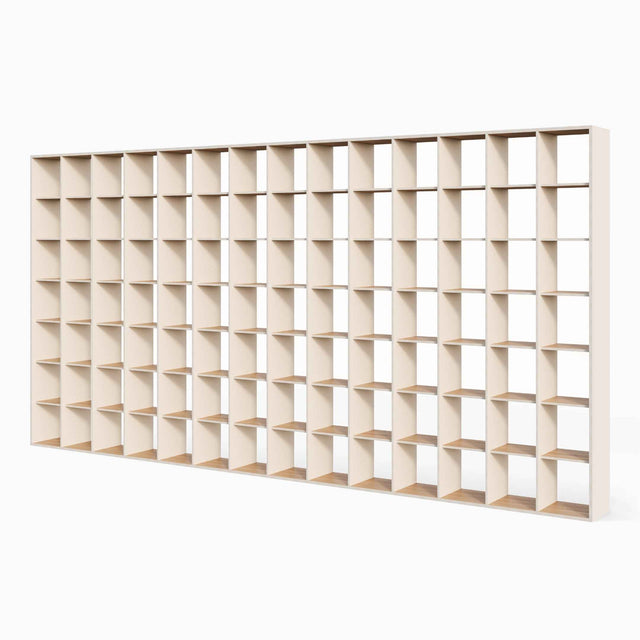 P.O.V. bookcase with magnolia laminate on one side of the uprights.