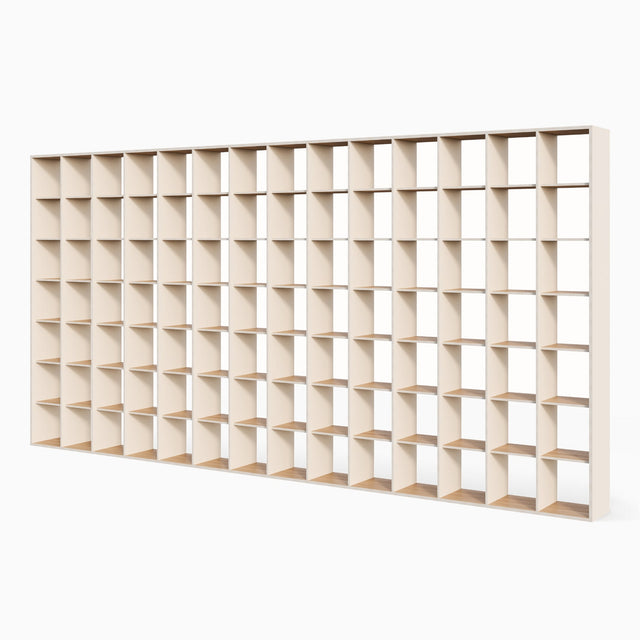 P.O.V. bookcase with magnolia laminate on one side of the uprights.