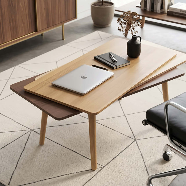 A wooden Stacked Coffee table provides a unique work surface in a light, bright home office. The table features an Oak top surface, an Ash middle and a Walnut bottom, along with 4 solid Oak legs.