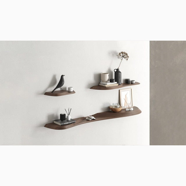 The 3 sizes of the Terrace wall shelves. Their carved terraces form platforms, at different heights, for a unique aesthetic.