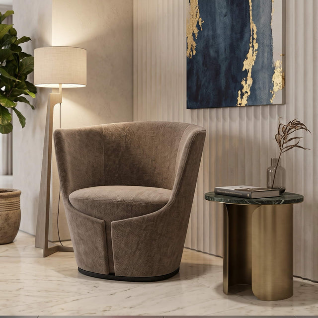 The Dapper Armchair in a premium taupe textured fabric makes the perfect accent chair in a quiet nook of a contemporary boutique hotel lobby.