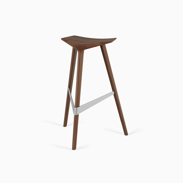 The Delta stool in gorgeous solid Walnut with a stylised brushed stainless steel footrest.