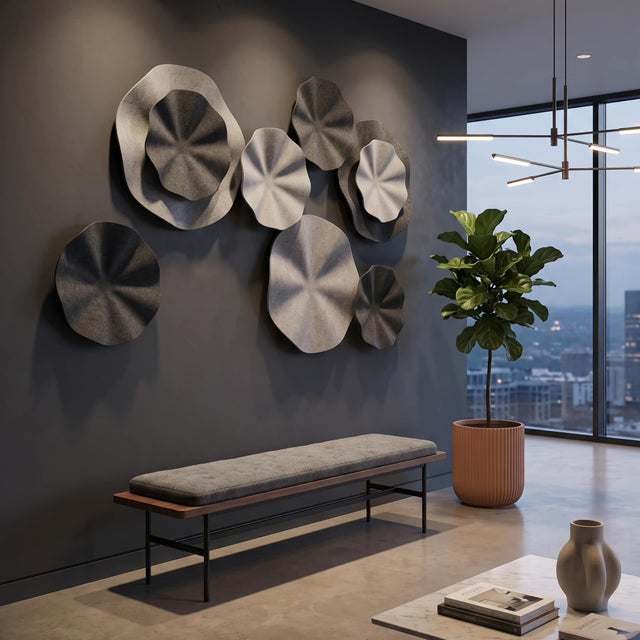An arrangement of Flutter acoustic wall panels makes up a beautiful, decorative feature wall in the reception of a workplace.