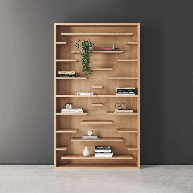 The X-Factor bookcase in Oak. Its shelves are purposefully offset to create an ‘X’ shape from the resulting negative spaces.