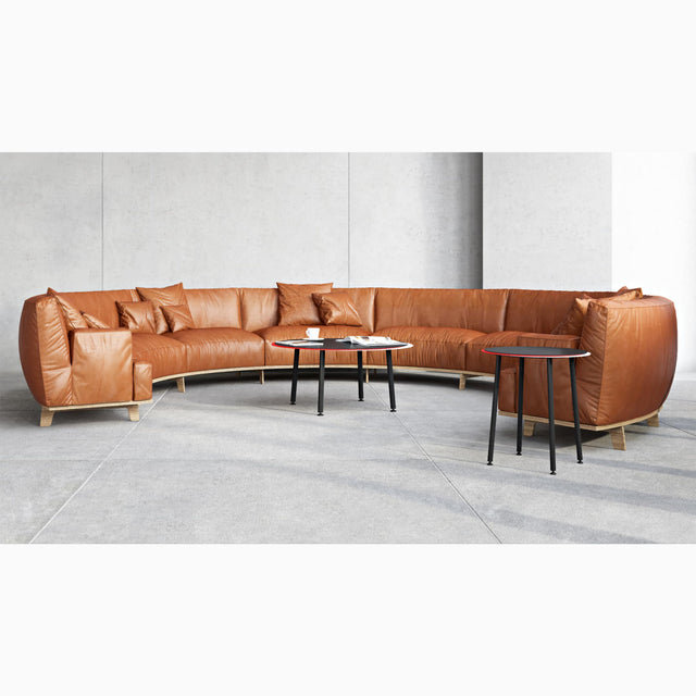 The steel versions of the Stacked coffee table & side table in a commercial interior. They offer a spirited, robust solution.