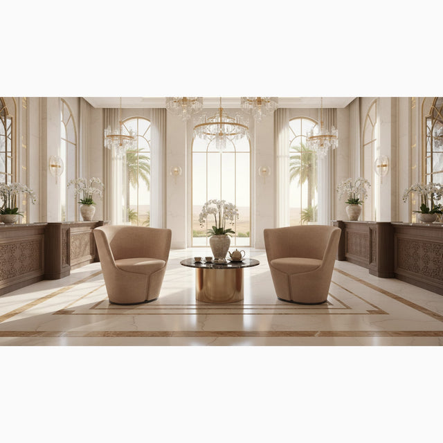 Two Dapper Armchairs in a nude shade in a tea room in an UAE hotel.