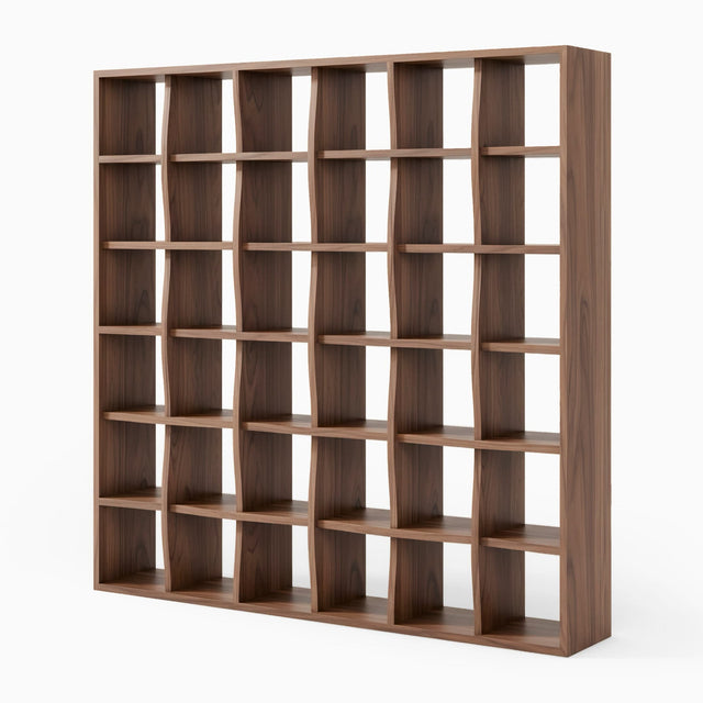 The Weave Bookcase in Walnut. The shelves and vertical columns ebb and flow in a weave-like structure.