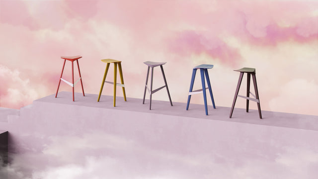 The Delta bar stool in 5 different colourways. The solid Oak version can be stained in any colour desired.