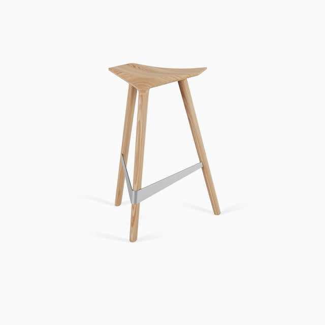 A Delta counter stool in solid Oak, with a brushed stainless steel footrest.