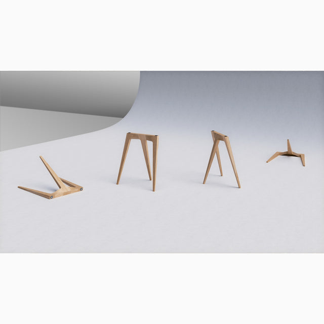 Four Flex Desk Legs scattered on a studio backdrop to show its form and construction from different angles.