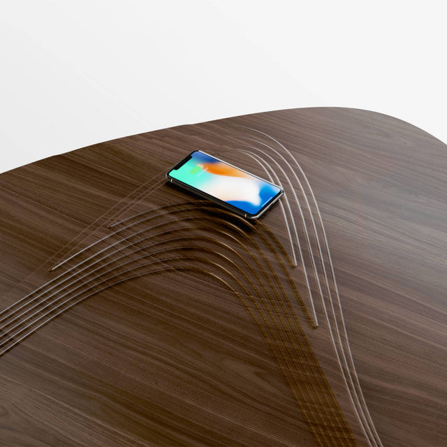 The Terrace coffee table’s highest peak can be fitted with a Qi-certified wireless charger, for use with compatible phones.