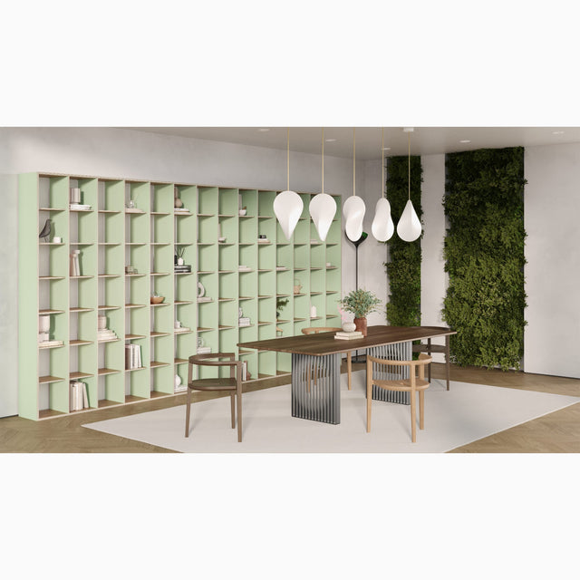 When viewing this green/pink P.O.V. bookcase from the far left side it appears exclusively green.