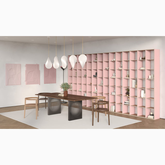 When viewing this green/pink P.O.V. bookcase from the far right side it appears exclusively pink.