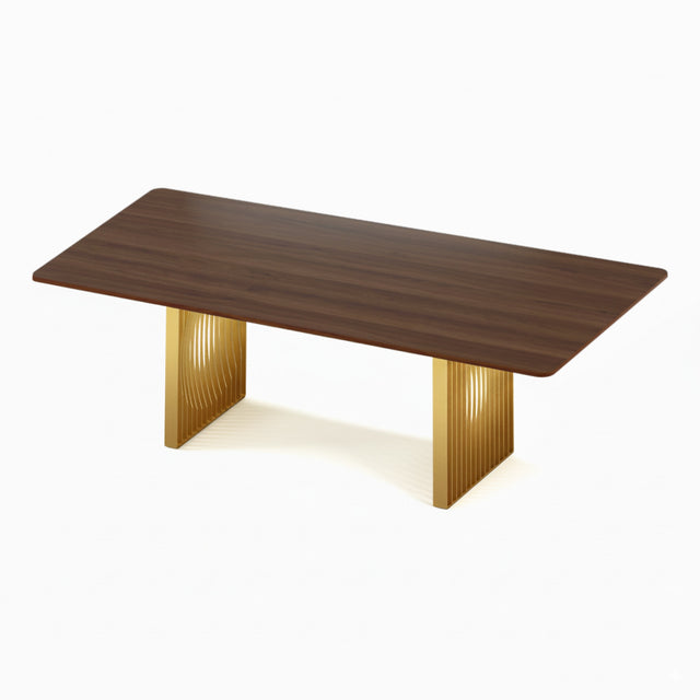 The Phantom Dining Table with a solid Walnut tabletop and metallic gold powder coated steel bases.