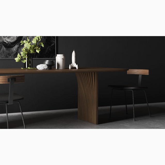 Sheer is the understated, pared back sibling of the Veer dining table. Its elegant legs are made from curved slats of wood.