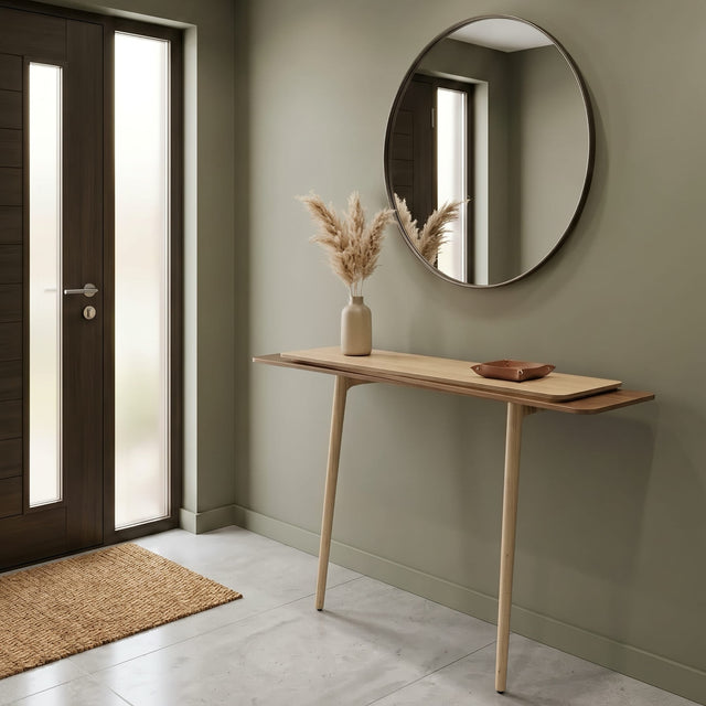 A wooden Stacked console table furnishes the entrance of light, modern home. The console features an Ash top surface, Walnut middle and Oak bottom, with solid two Ash legs. 