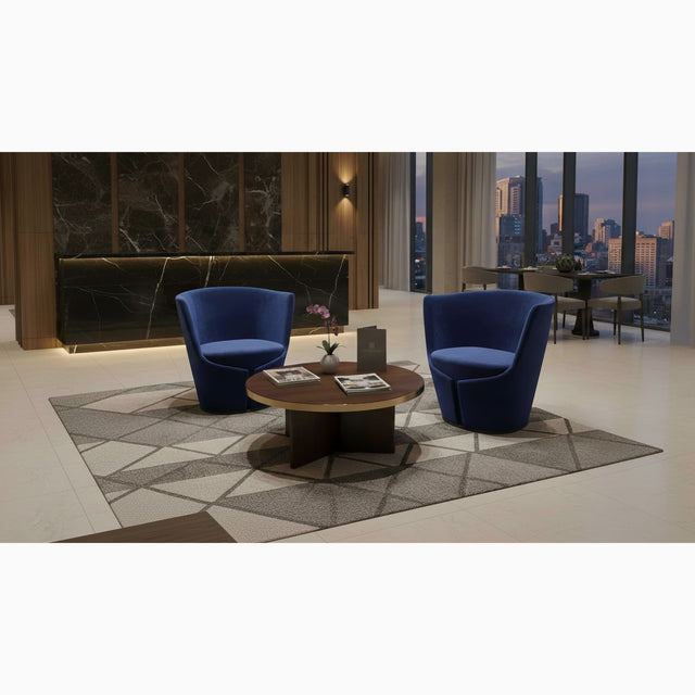 Two Dapper Armchairs in blue in a waiting area in a 5 star hotel.