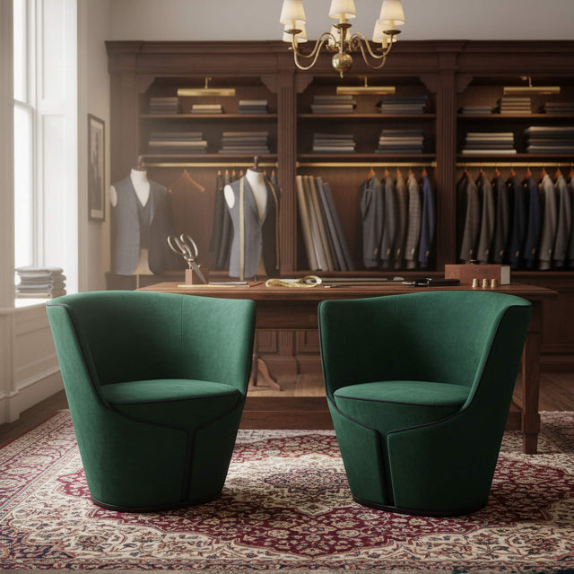 Two Dapper Armchairs in green fabric with black piping in a Tailor's shop.