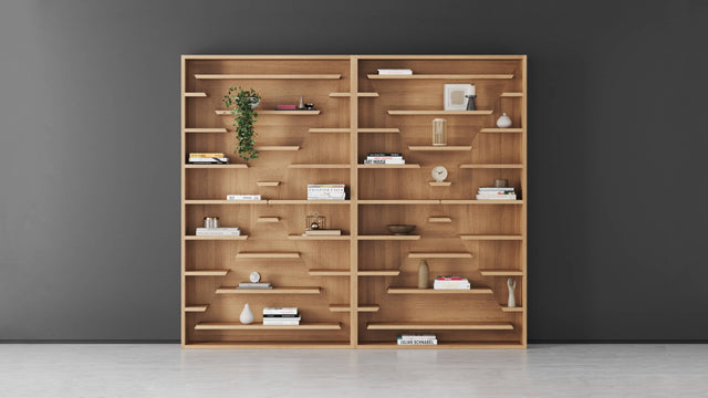 Two X-Factor bookcases in a row. The X-shape resulting from the displacement of shelves create a diamond tessellation.