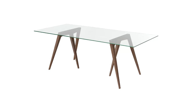The minimalist, reductive design of the Flex trestle table legs is complimented here by a simple, clear glass tabletop.