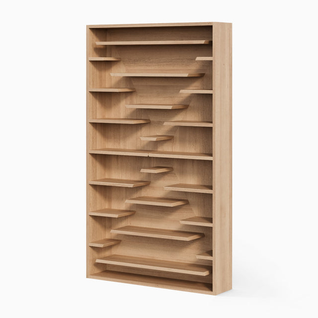The X-Factor bookcase in solid Oak. Its design is inspired by fissures create by the movement of tectonic plates.